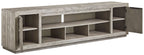 Naydell - XL TV Stand w/Fireplace Option - Gray