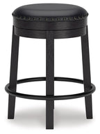 Valebeck - Upholstered Swivel Stool