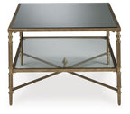 Cloverty - Rectangular Cocktail Table - Aged Gold Finish