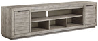 Naydell - XL TV Stand w/Fireplace Option - Gray
